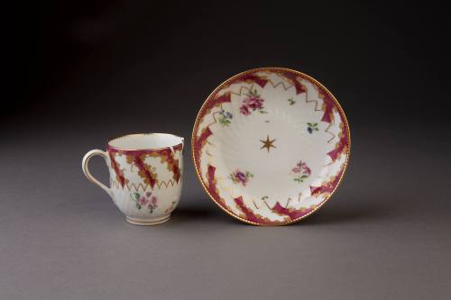 Chelsea Pine Cone-Molded Coffee Cup and Saucer with Claret-Ground Panels and Floral Springs, 17 ...