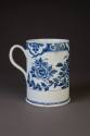 Bow Cylindrical Mug Painted in Underglaze Blue with Oriental Flowering Plants and Rockwork, ca. ...